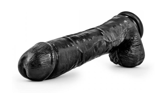 Big Black Dildo big black realistic dildo over white background
