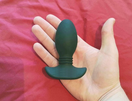 Butt plug in hand Start with smaller but plugs
