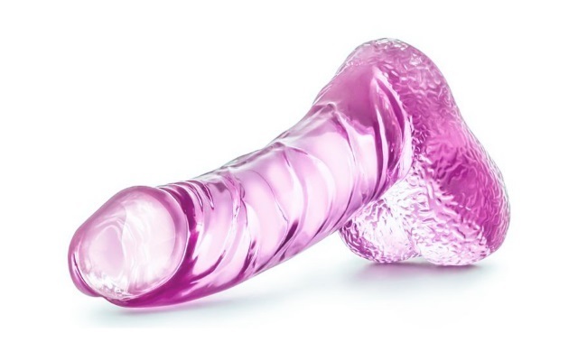 Jelly Dildo purple jelly dildo over white background