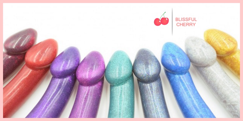 Multiple Colored Dildos Multiple colored dildos arranged alongside one another
