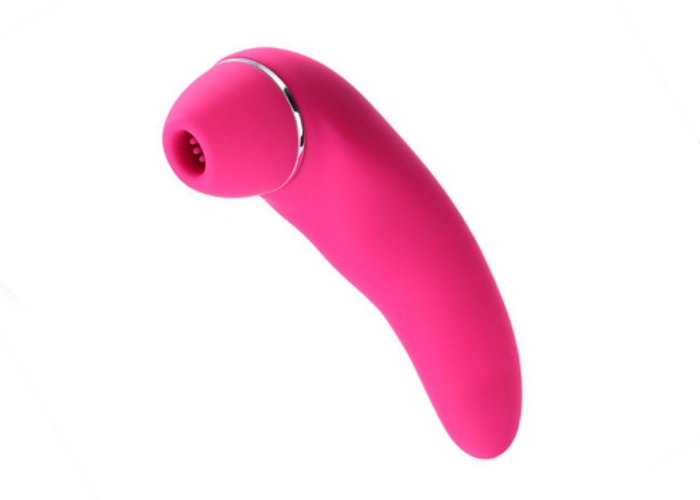 Pink Clitoral Vibrator Pink clitoral (oral sex) vibrator with white background