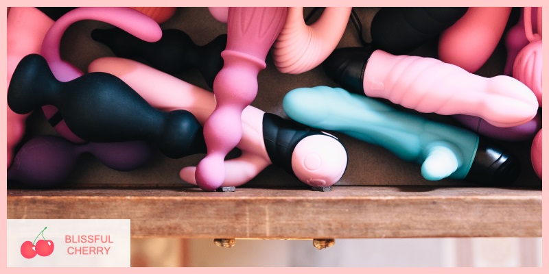Sex Toy Collection Various sex toys tucked away in a drawer