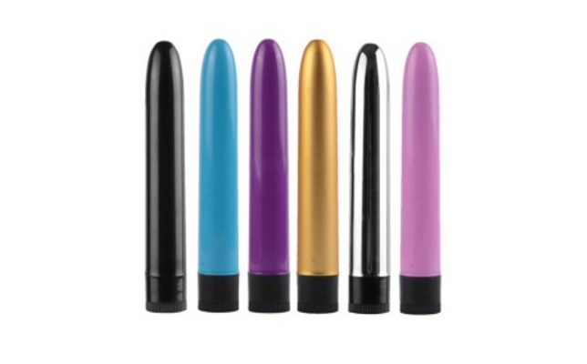 Six Plastic Classic Vibrators Six straight vibrators of various colors with white background