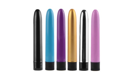 Six Plastic Vibrators six plastic vibrators of various colors over white background